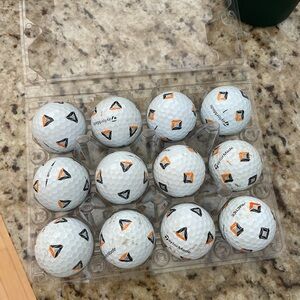 TaylorMade White Golf Balls with Orange and Black Logos — Dozen
